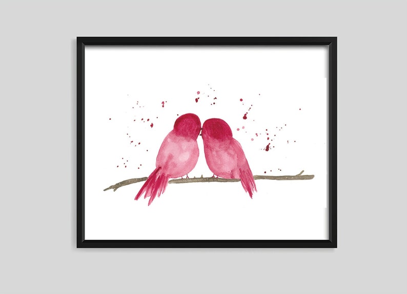 Two red watercolor birds in love. They are on a branch.