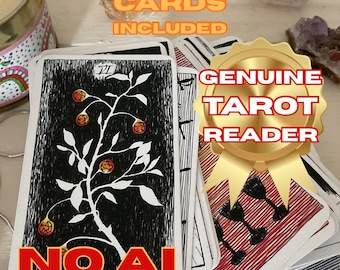 May include: A deck of tarot cards with a black and white design featuring a tree with fruit. The cards have the text "NOAI GENUINE PSYCHIC" and "GENUINE TAROT READER" on them. The image also includes crystals and a candle.