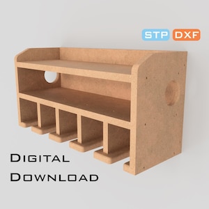 May include: A light brown wooden wall-mounted organiser with multiple compartments. It features a top shelf, a middle shelf, and several slots below. The text "STP DXF" is in the upper right corner, and "DIGITAL DOWNLOAD" is at the bottom.