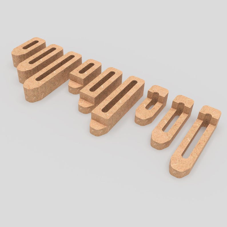 May include: A set of ten wooden shelf brackets in various sizes. The brackets are made of natural wood and have a rustic look. They are perfect for adding a touch of farmhouse style to your home decor.