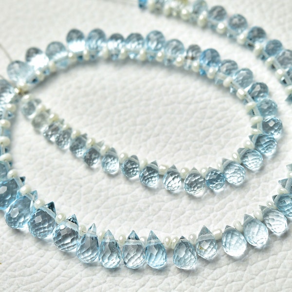 thumbnail interactive-video image 1 of FULL 8 Strand 5-7mm Deep Sky Blue Topaz Faceted Briolette Tear Drop Beads 1 of 2
