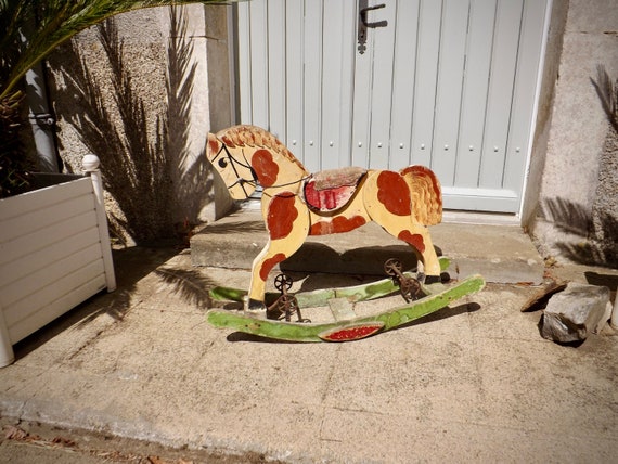 Bouncing horse on best sale wheels