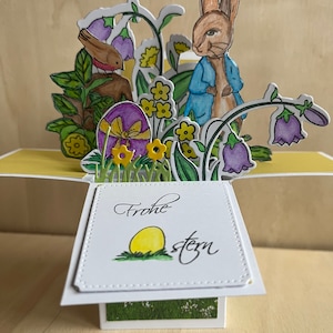 Carte de Pâques colorée avec lapin de Pâques et fleurs