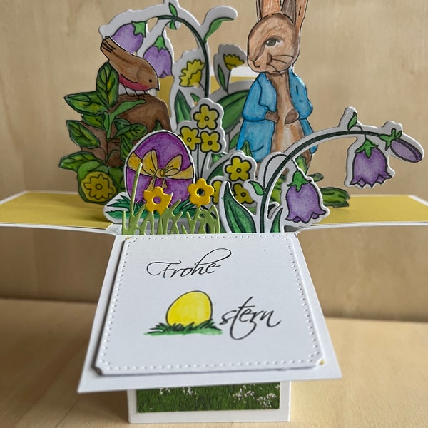 Colorful Easter card with Easter bunny and flowers