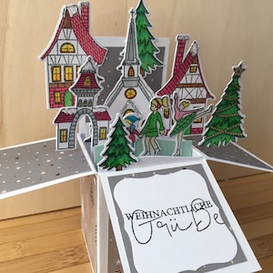 Village de Noël patineurs sur glace sapin de Noël