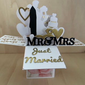 Carte de mariage élégante noir blanc or