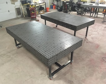 Slot and outlet tab welding table