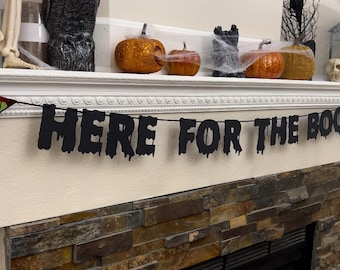 Hier voor de Boos Halloween-slinger: cocktailpartybanner