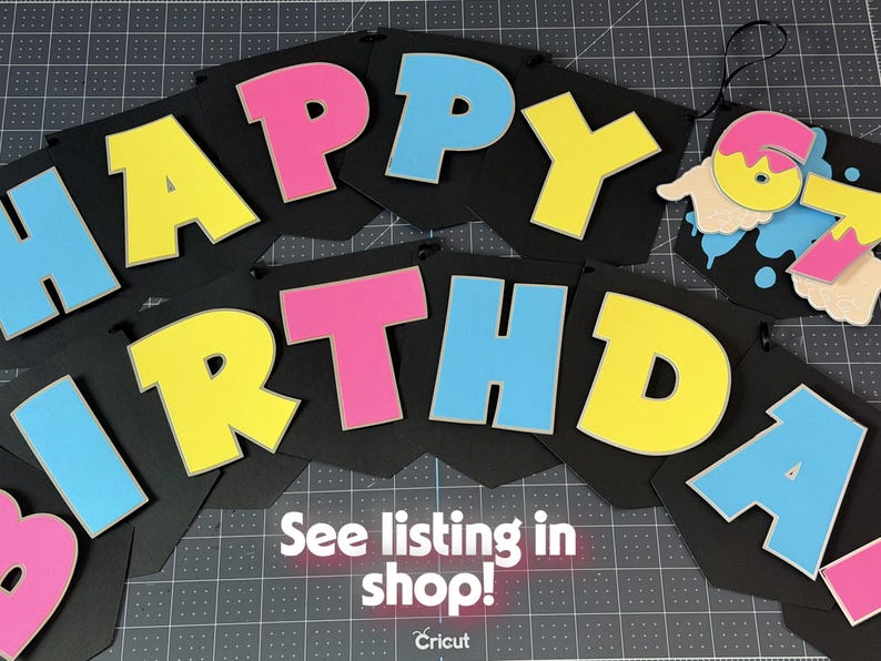 May include: A black banner with the words "HAPPY BIRTHDAY" in large, colorful letters. The letters are outlined in white and filled with pink, yellow, and blue. The banner also includes a number 6 and 7. Text at the bottom says "See listing in shop!"