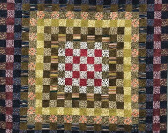 Basketweave quilt pattern uses graphic fabric in an interesting pattern.  Project size is 86" x 86"