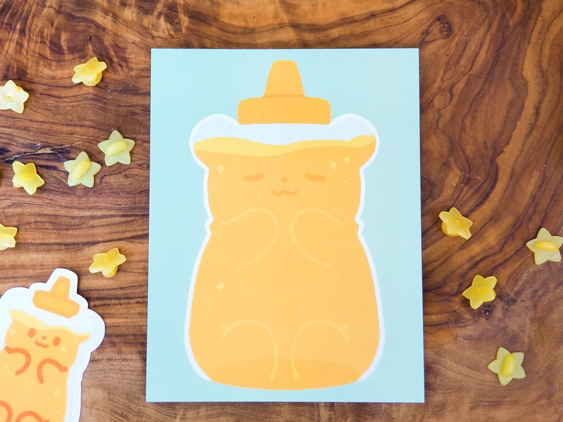 May include: A yellow honey bear bottle illustration on a light blue background. The honey bear is smiling and has a white lid.