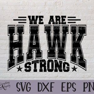May include: Black and white graphic design with the text "WE ARE HAWK STRONG" in a bold, blocky font. The text is surrounded by two stars.