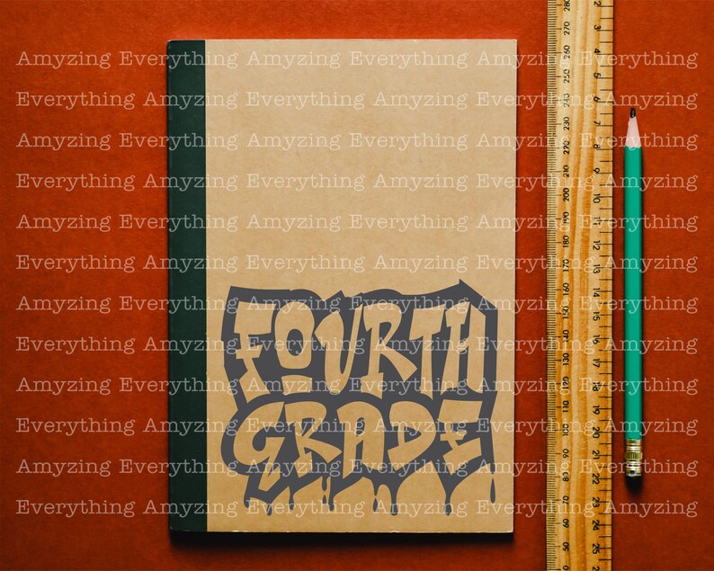 May include: A brown notebook with a green spine. The notebook has the words "FOURTH GRADE" written on it in a black, dripping font.