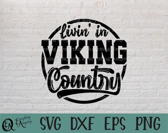 Może przedstawiać: Czarno-biały projekt graficzny z okręgiem wokół tekstu "livin' in VIKING Country".