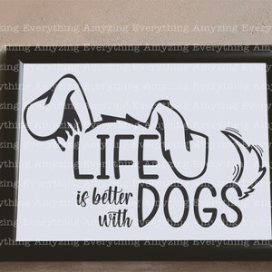 May include: Black and white graphic design of a dog's head with the text "Life is better with dogs" in a white frame.