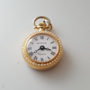 Birks pocket watch top