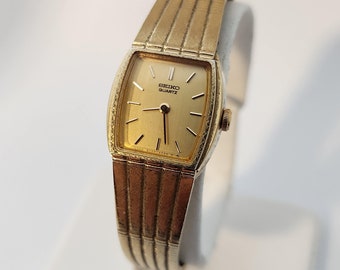 Seiko 4N21-5022 QZ Womens Watch Octagon Champagne Dial