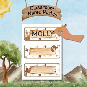 May include: Printable classroom name plates with a woodland theme. The plates feature a brown wooden sign with a white background and a cute animal illustration. The text "Classroom Name Plates" is written on a wooden sign at the top of the page. The name "MOLLY" is written on one of the plates.