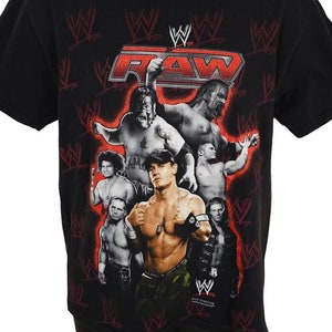 WWE ジョン・シナ 直筆サインミニ色紙とバスケットシャツ - メルカリ