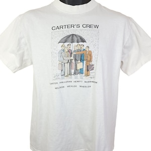 Koszulka z nadrukiem Carters Crew Cartoon Vintage z lat 90. Oszustwo w Winthrop Securities Wyprodukowano w USA Męska Rozmiar M