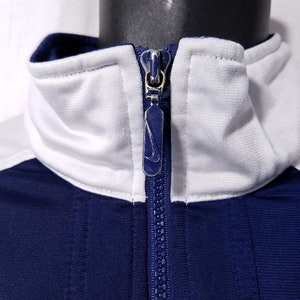 Nike Jacka Vintage 90-tals Jumbo Swoosh Spell Out Vit Tagg Blå Herr Storlek Small bild 3