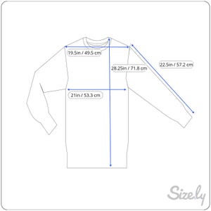 May include: A white long-sleeved shirt with measurements in inches and centimetres.