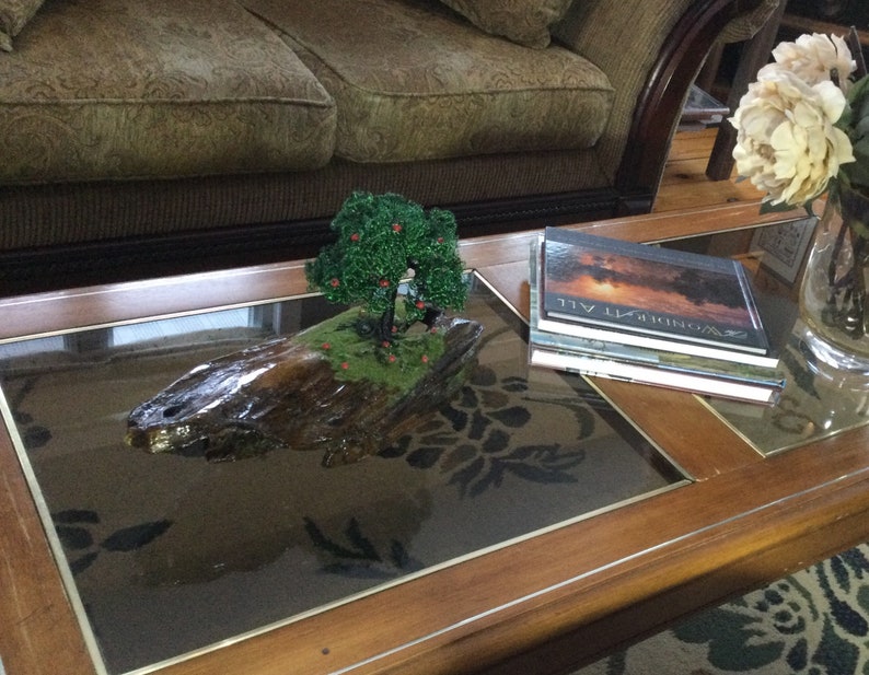 a handmade Apple wire tree Childhood Remembered\u201d \u201d A beautiful piece of driftwood and a tire swing to take us back to lazy summer days.