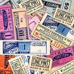 May include: A collection of vintage paper coupons and tickets. The coupons are for one pint of milk, a cafeteria, and a monthly business ticket. The tickets are printed in various colors, including blue, red, yellow, and pink. The text on the coupons includes "Good for One Pint Milk", "Y.M.C.A. Cafeteria", and "Louisville & Nashville R.R. Co."