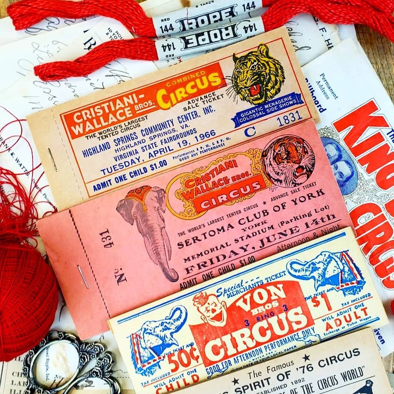 May include: Vintage circus ticket stubs with red, white, and blue color schemes. The tickets advertise the Cristiani Wallace Bros. Circus and the Sertoma Club of York. The tickets are dated April 19, 1966 and June 14th. The tickets advertise the price of admission for children and adults.