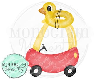 May include: A red toy car with a yellow duck wearing a yellow inner tube on top. The car has black wheels and a yellow steering wheel. The words "Monogram Moments" are printed on the car.