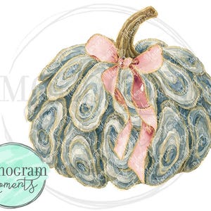 May include: A watercolour illustration of a pumpkin with a distinctive design. The pumpkin is a blend of blue, grey, and gold, adorned with a pink ribbon. The image includes the text "Monogram Moments" and the number "2025".