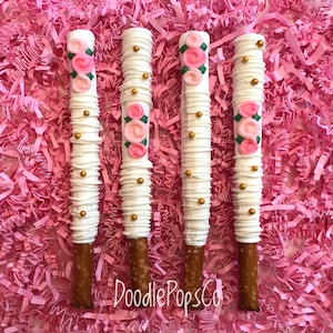 Floral pretzel rods / baby girl shower favor / chocolate covered pretzel / one dozen (12)