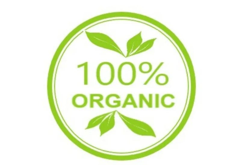 May include: A green circle with white text that reads "100% ORGANIC" and two green leaves on either side of the text.