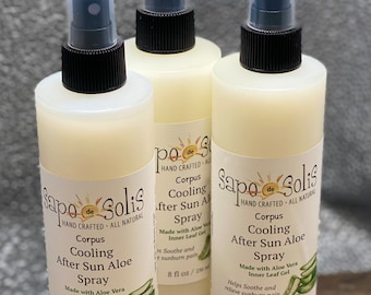 May include: Three clear plastic bottles of cooling after sun aloe spray. Each bottle is labeled "Sapo de Solis" and "Corpus Cooling After Sun Aloe Spray". The bottles are made with aloe vera and inner leaf gel to help soothe and relieve sunburn pain. Each bottle contains 8 fl oz / 236 ml.