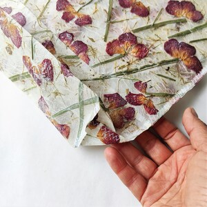 Handmade paper with dried rose gift bag.  This boho floral gift bag will add a beautiful touch to any gift.