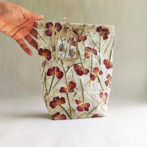 Handmade paper with dried rose gift bag.  This boho floral gift bag will add a beautiful touch to any gift.