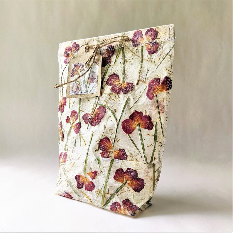 Handmade paper with dried rose gift bag.  This boho floral gift bag will add a beautiful touch to any gift.