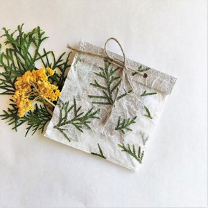 Sacchetti di carta fatti a mano per gioielli natalizi, piccole confezioni regalo per le feste