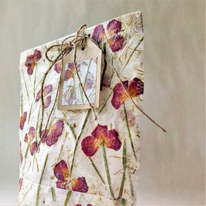 Handmade paper with dried rose gift bag.  This boho floral gift bag will add a beautiful touch to any gift.