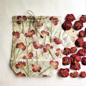 Handmade paper with dried rose gift bag.  This boho floral gift bag will add a beautiful touch to any gift.