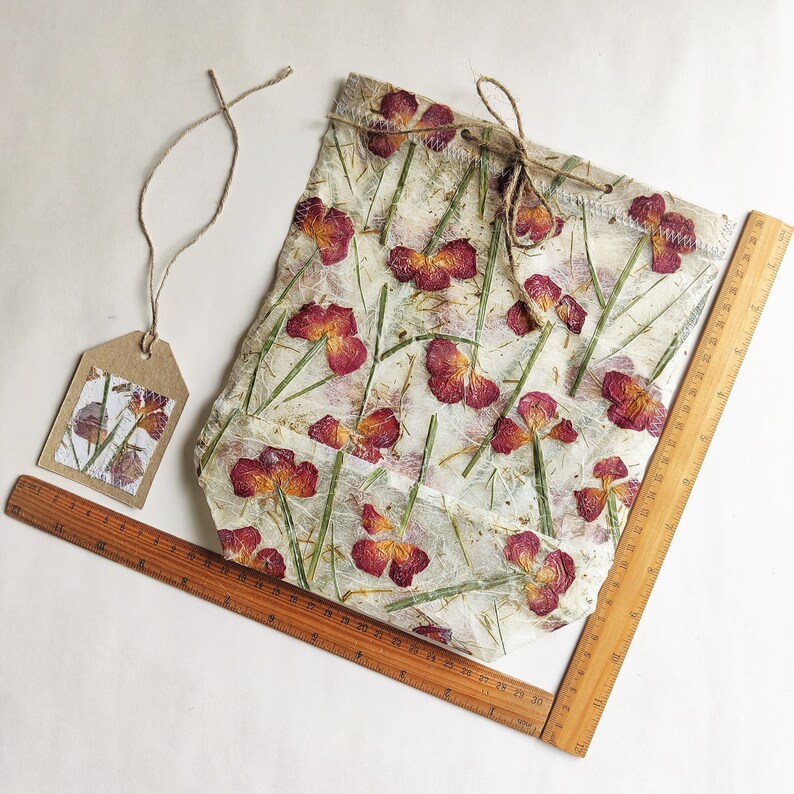 Handmade paper with dried rose gift bag.  This boho floral gift bag will add a beautiful touch to any gift.