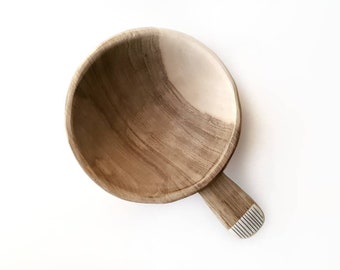 Small wooden bowl with handle