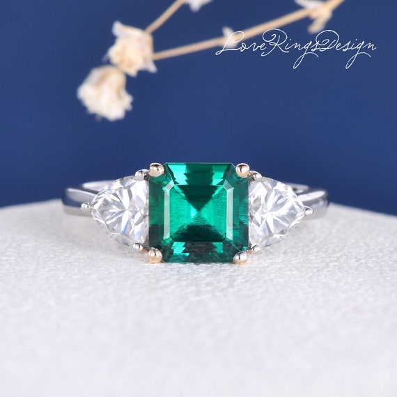 Square emerald hotsell ring design