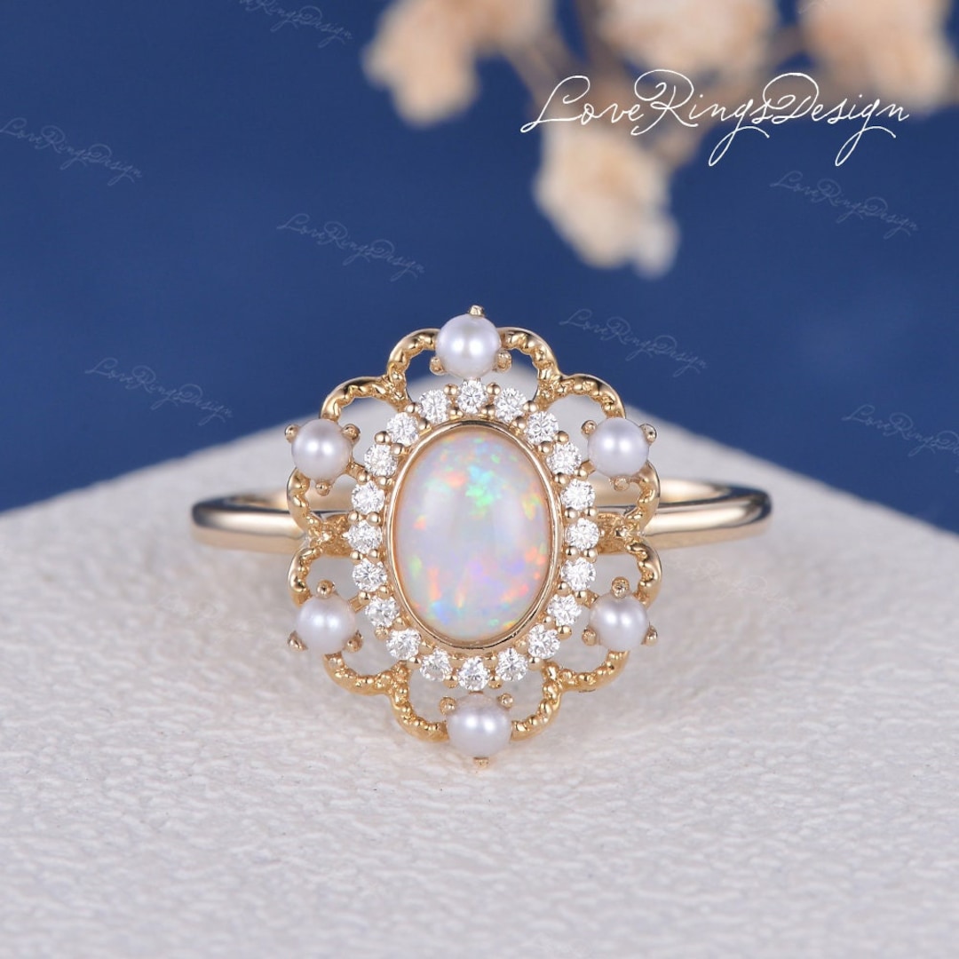 Pearl and 2024 opal engagement ring