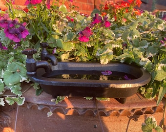Small cast iron bath tub style birdbath / feeder