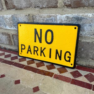 Placa de prohibición de estacionamiento de hierro fundido de color amarillo y negro de alta calidad, estilo antiguo vintage