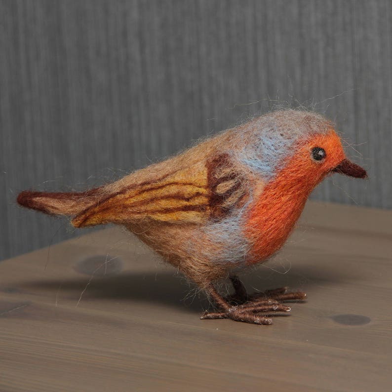 home decoration. Needle felted bird Redbreast Life size
