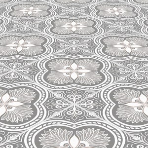 May include: A repeating pattern of gray and white floral tile. The design features stylized flowers and scrolling vines within a quatrefoil shape. The tiles are arranged in a grid, creating a seamless pattern.