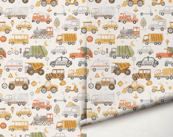 May include: A roll of wallpaper featuring a repeating watercolor pattern of various vehicles including fire trucks, police cars, school buses, construction equipment, trains, and scooters, interspersed with small icons like trees, moons, and stars.