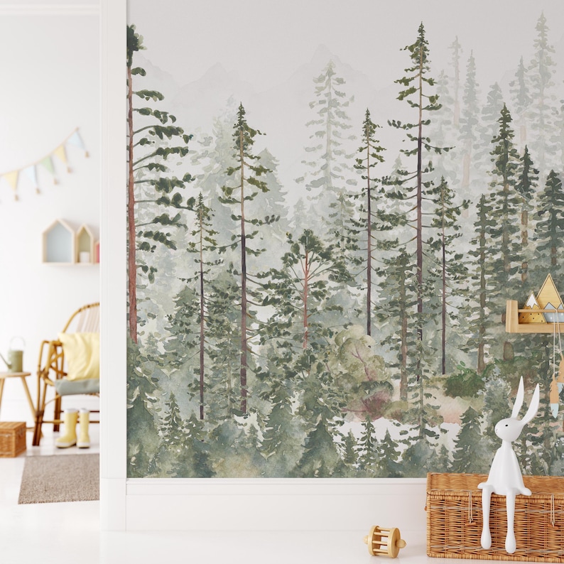 May include: Watercolor forest mural featuring tall evergreen trees and distant mountains in shades of green and gray. The artwork creates a serene, naturalistic scene, suitable for a nursery or children's room. The mural is a decorative wall covering.